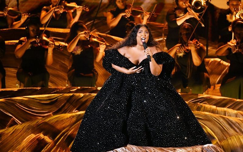 Lizzo collects a Billboard Music Award to add to her trophy cabinet