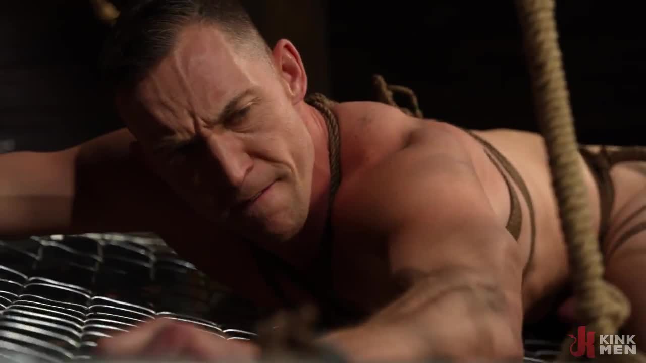 Leather Dom Chris Damned Punishes Ethan Sinn in Latest Bound Gods Feature